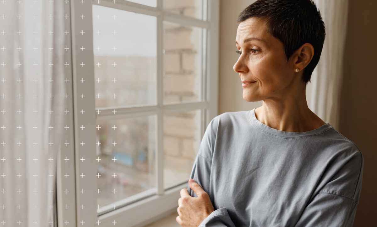 Woman looking out the window