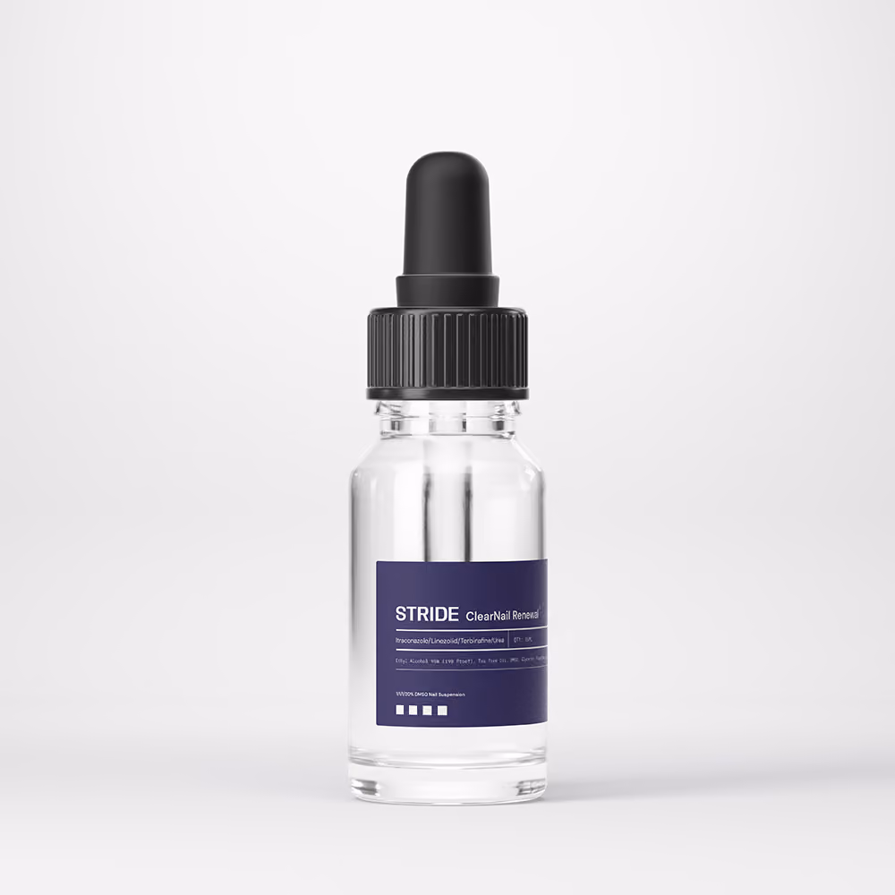 On a gray background STRIDE logo bottle with transparent liquid and black cap.