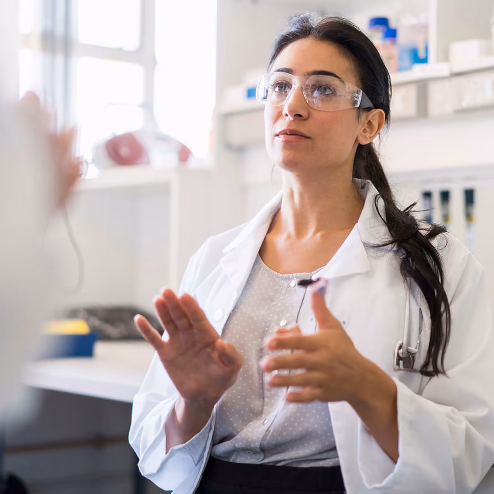 A doctor in a white coat