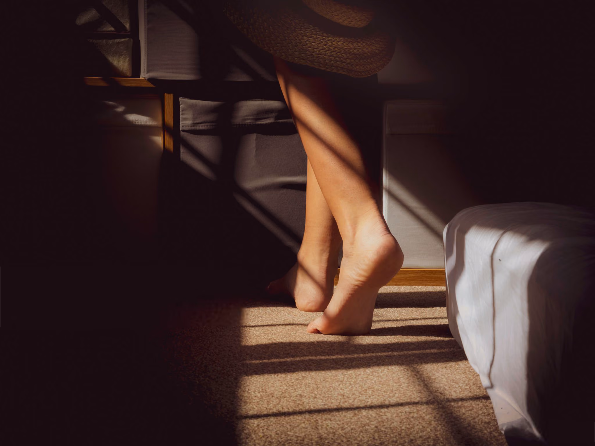 A doctor scrutinizes a patient's foot.