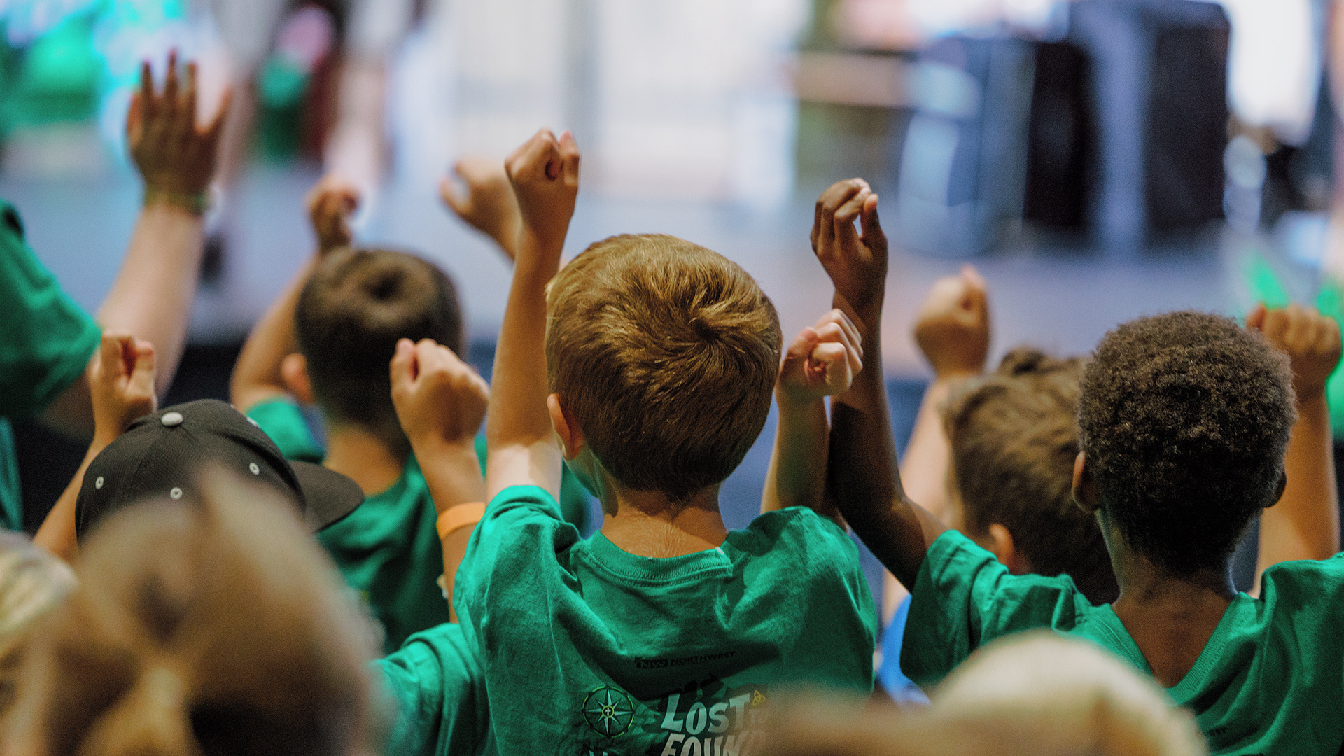 Awana T&T boys holding up their Bibles