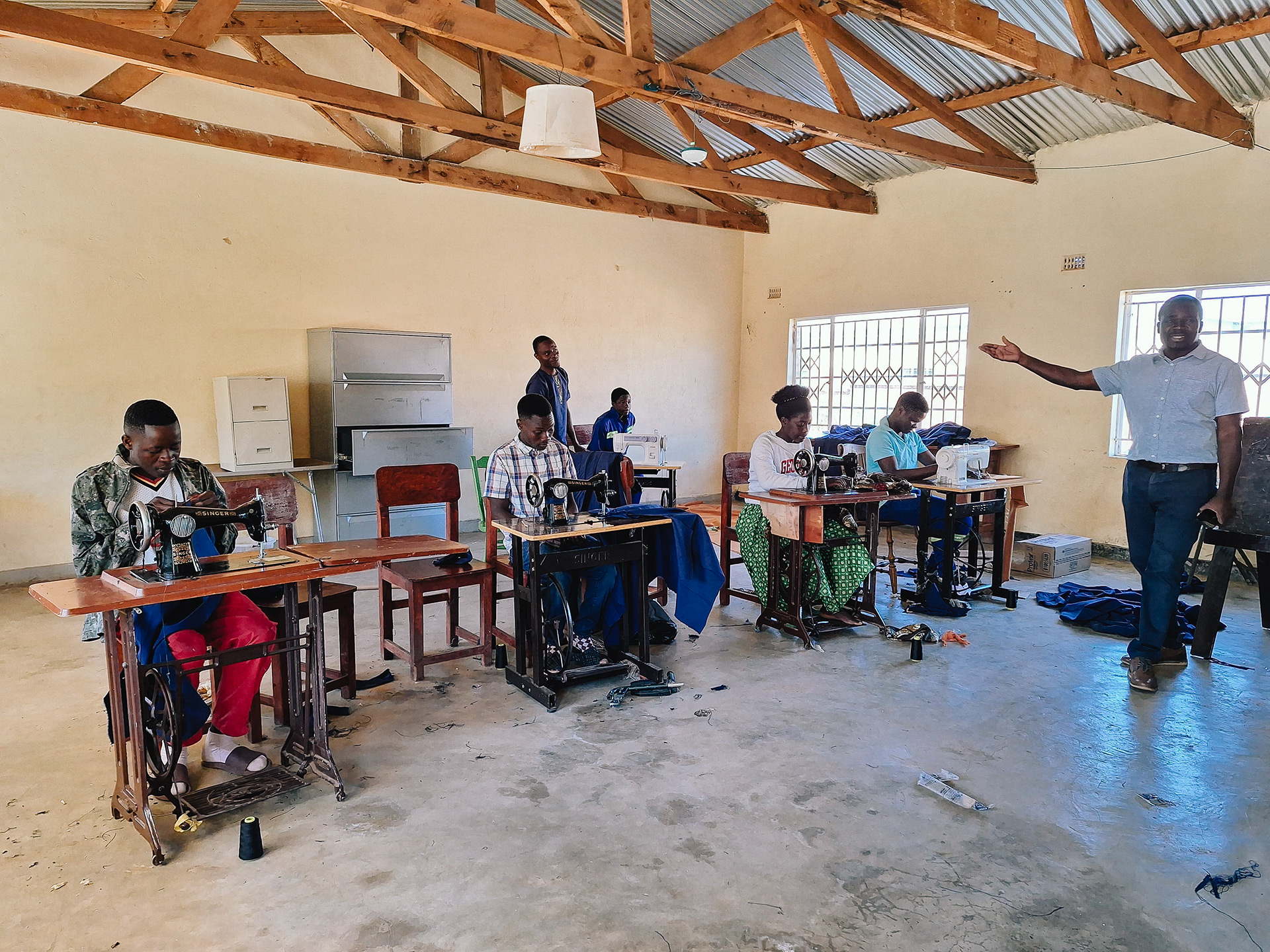 Graduated interns from the Vocational Training School at the Passion Center. They specialize in tailoring and fashion design.