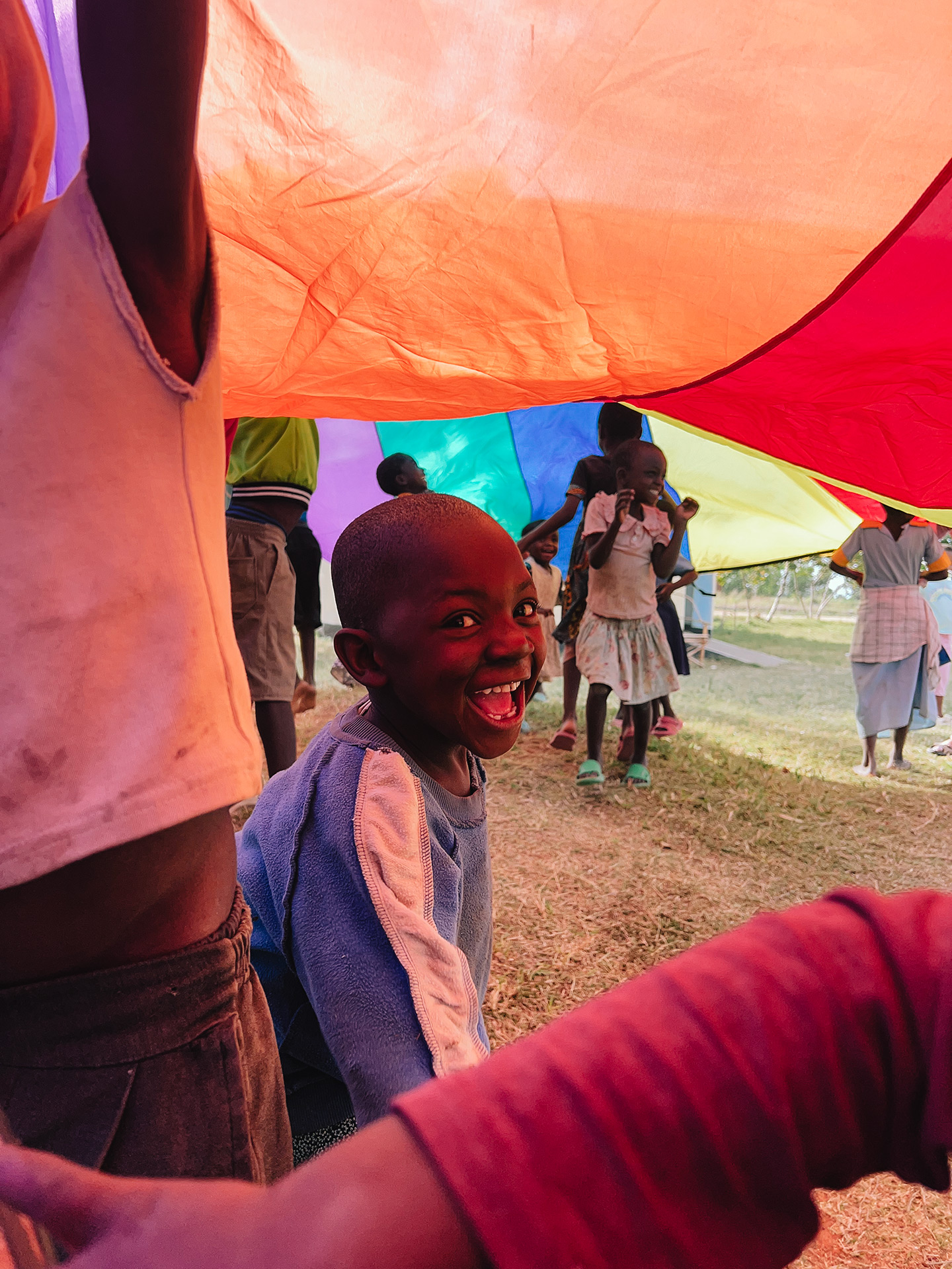 The young kids absolutely loved the rainbow parachute when we were playing at Jali!