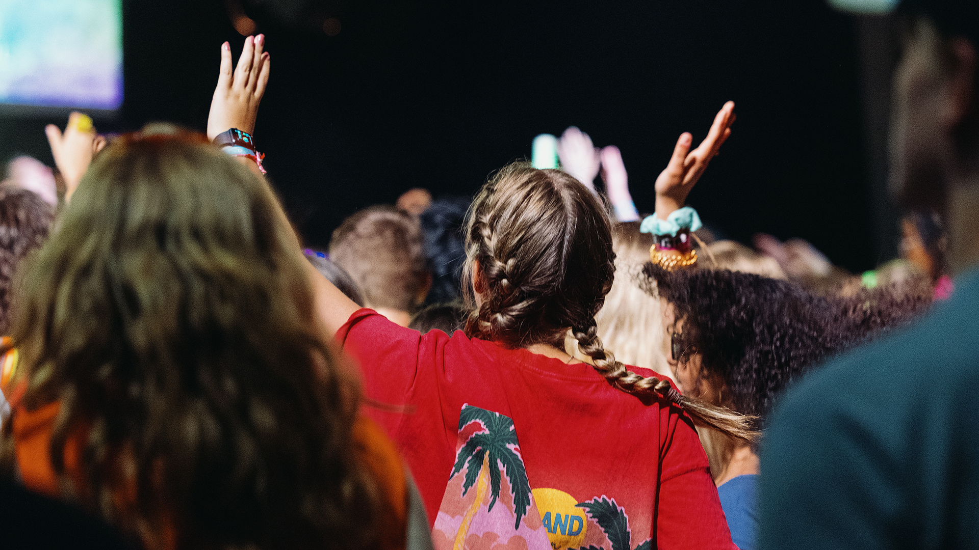 students worshipping at camp