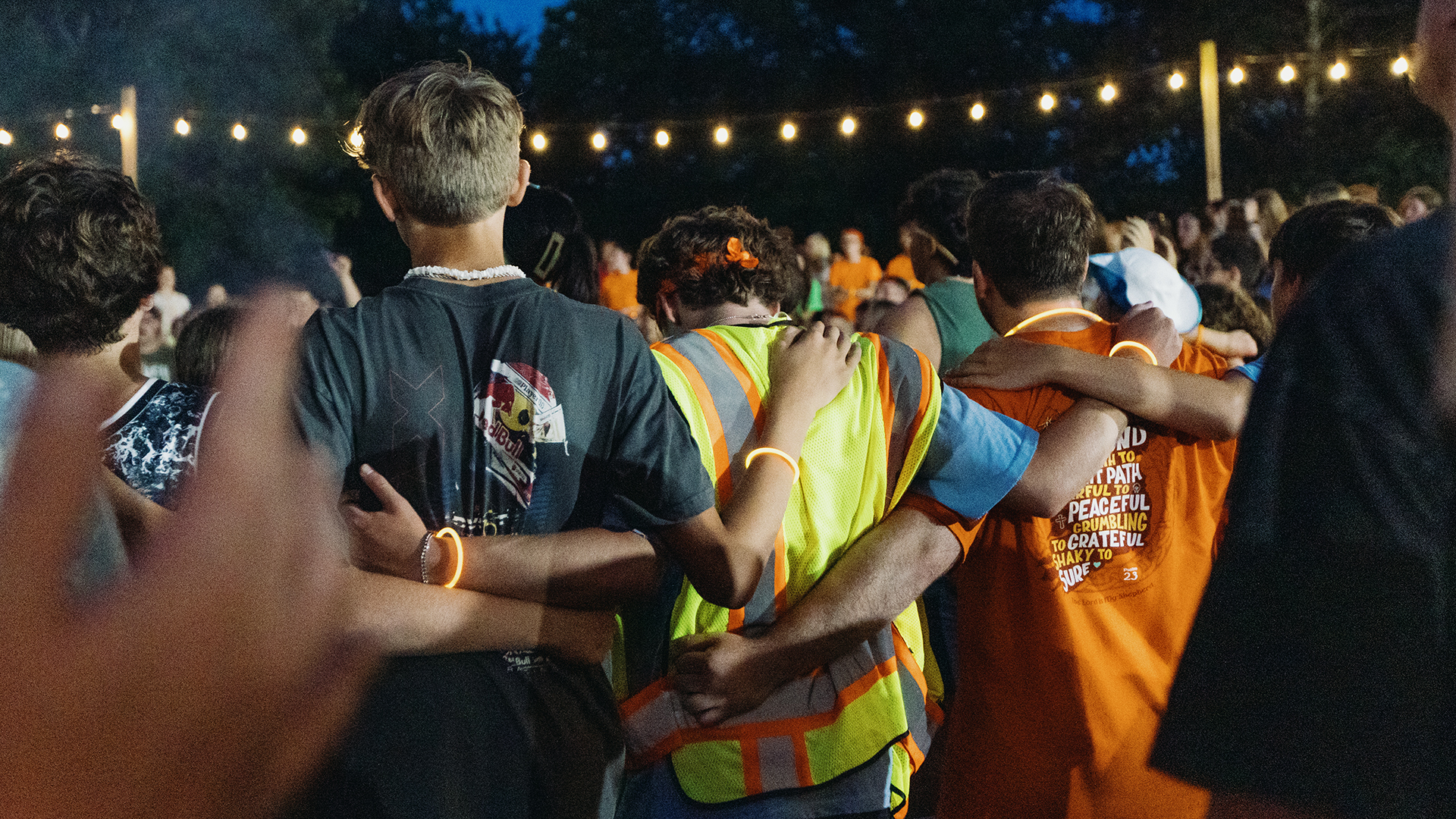 students worshipping at camp