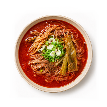 Yukgaejang(육개장) is a traditional Korean spicy beef soup made with tender, slow-cooked beef, green onions, and vegetables simmered in a rich, deeply flavorful broth. Seasoned with Korean chili pepper and aromatic spices, the soup has a bold, savory flavor with a satisfying kick of heat.

A beloved Korean comfort food, Yukgaejang is especially known for its hearty beef, warming broth, and layers of spicy, umami-rich flavor. Served hot with steamed rice, it is a filling and comforting choice for anyone looking to experience an authentic Korean beef soup.