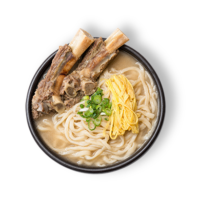 Rich and hearty beef & anchovy broth with beef ribs, green onion, potato and egg garnish.