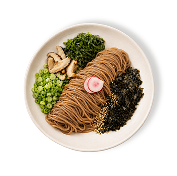 Hangari Kalguksu's Perilla Oil Makguksu - Chilled buckwheat noodles tossed with aromatic perilla leaves and oil, savory soy sauce, roasted seaweed, and sesame seed.