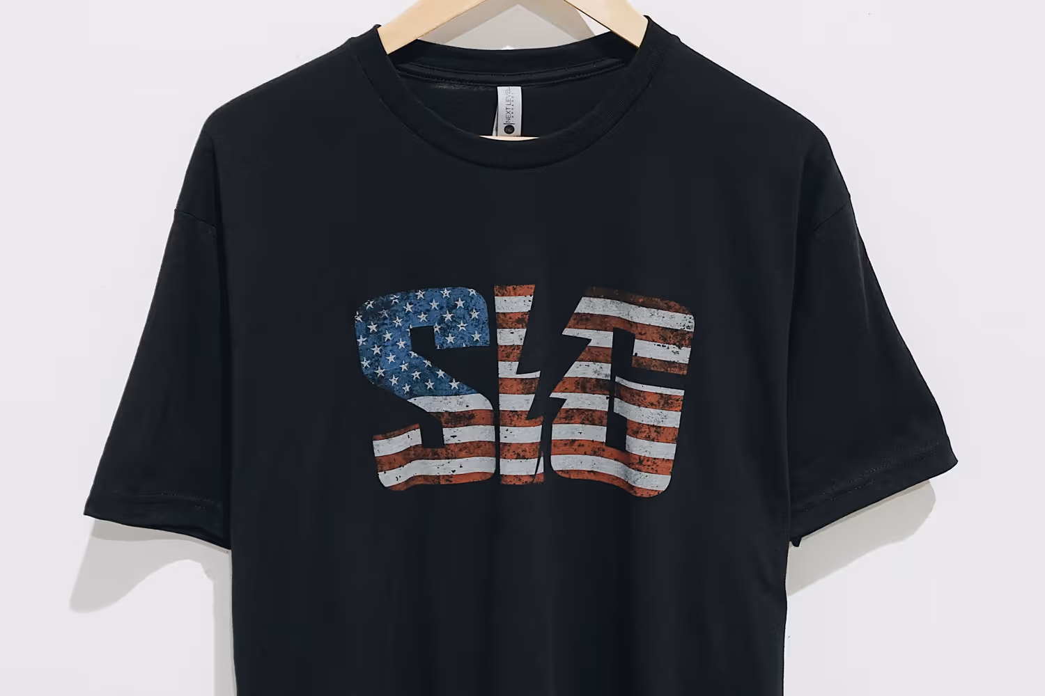 In image of a screen printed t-shirt and the name SIG using the vintage distress effect.