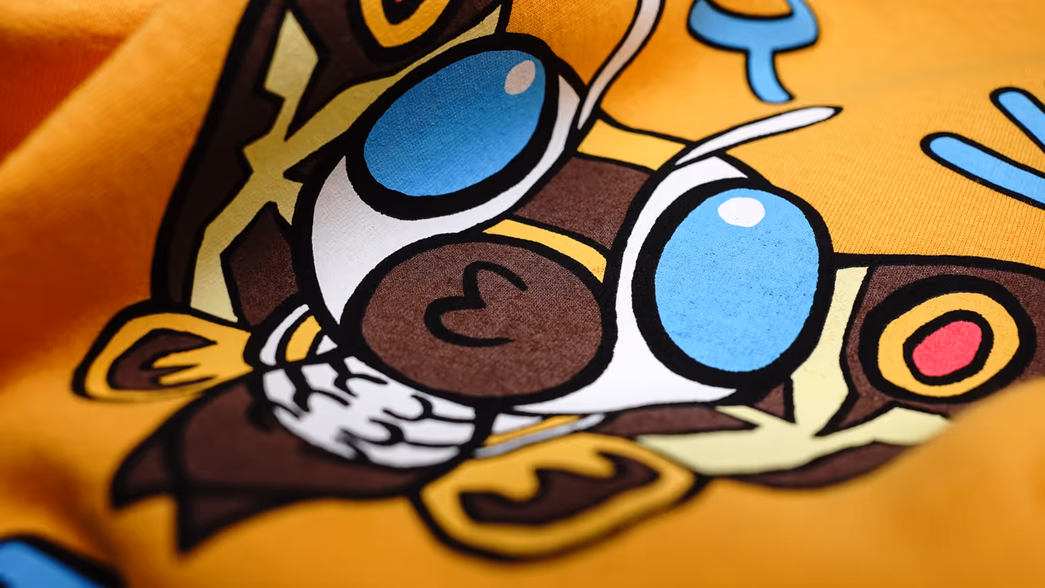 A close up image of a screen print featuring the monster Mothra.