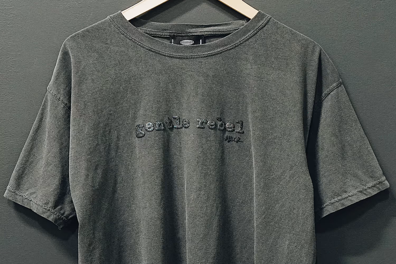 A completed picture of a high density screen print featuring the name Gentle Rebel.