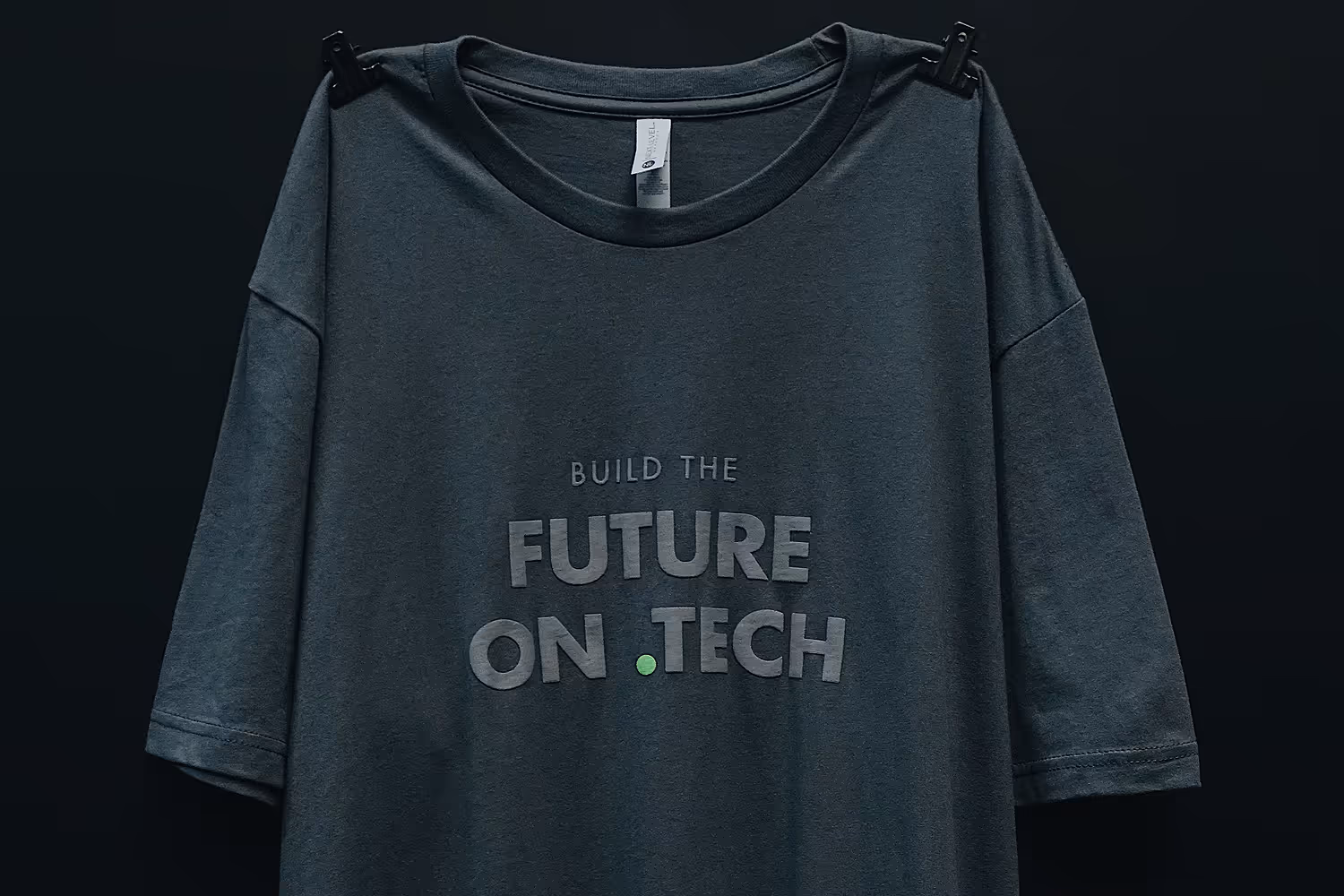 An image of a screen printed shirt that says Build the Future on Tech.