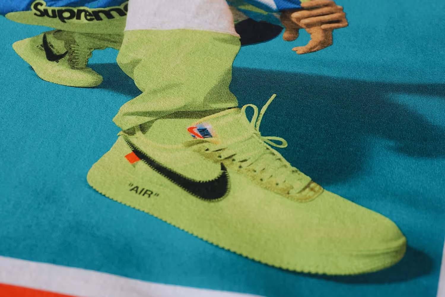 A close up image of Diljit Dosanjh Nike Air Force 1's in neon green.