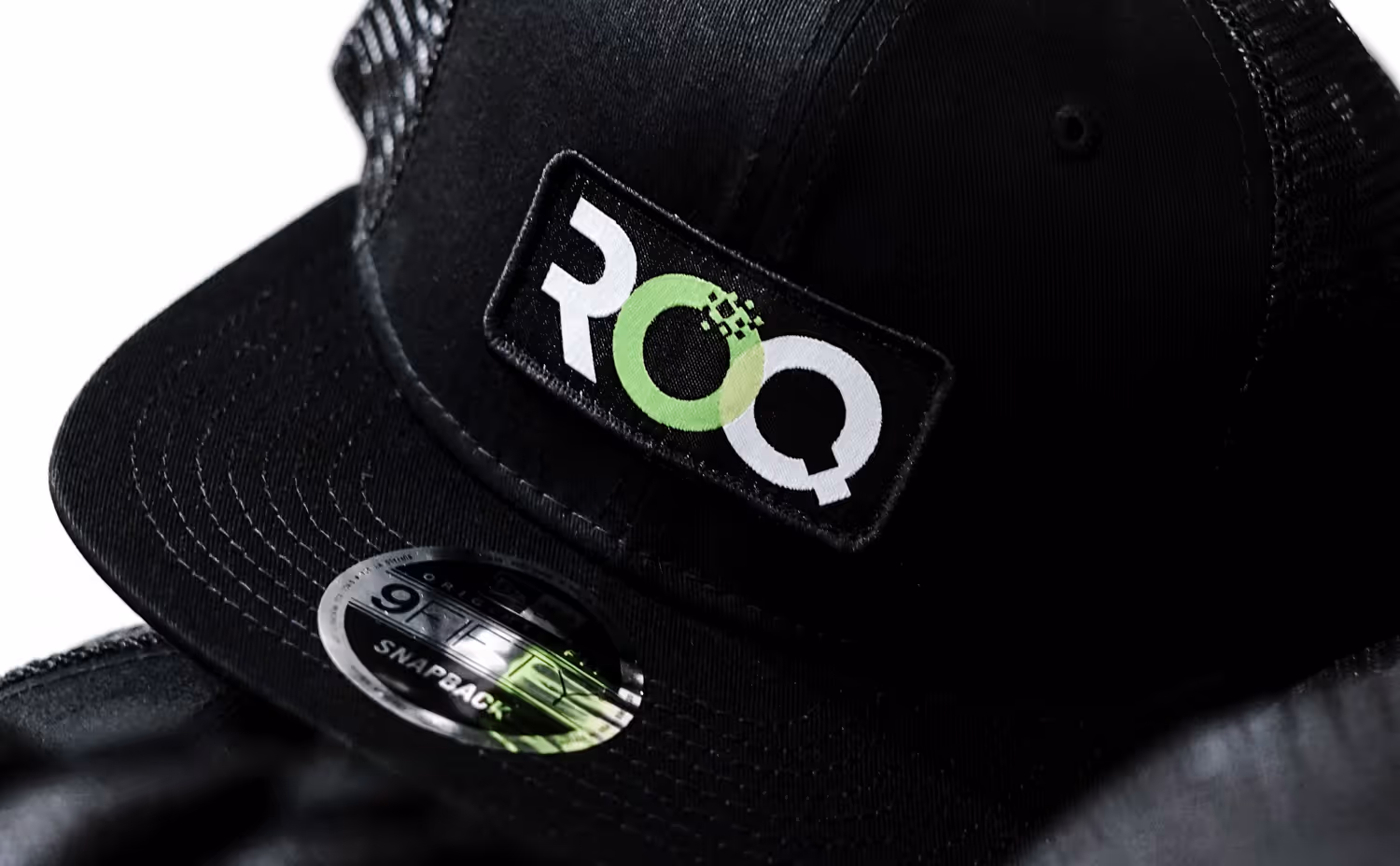 Custom patch hat application for ROQ U a screen printing equipment brand.