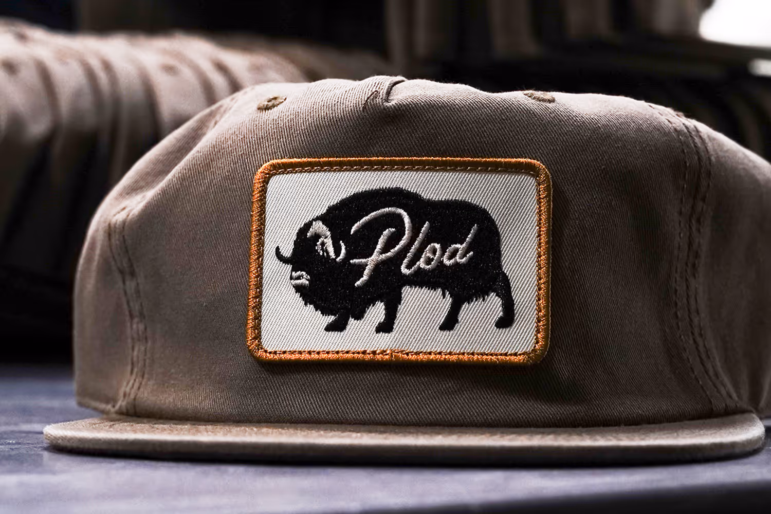 A custom embroidered patch hat featuring a bison.