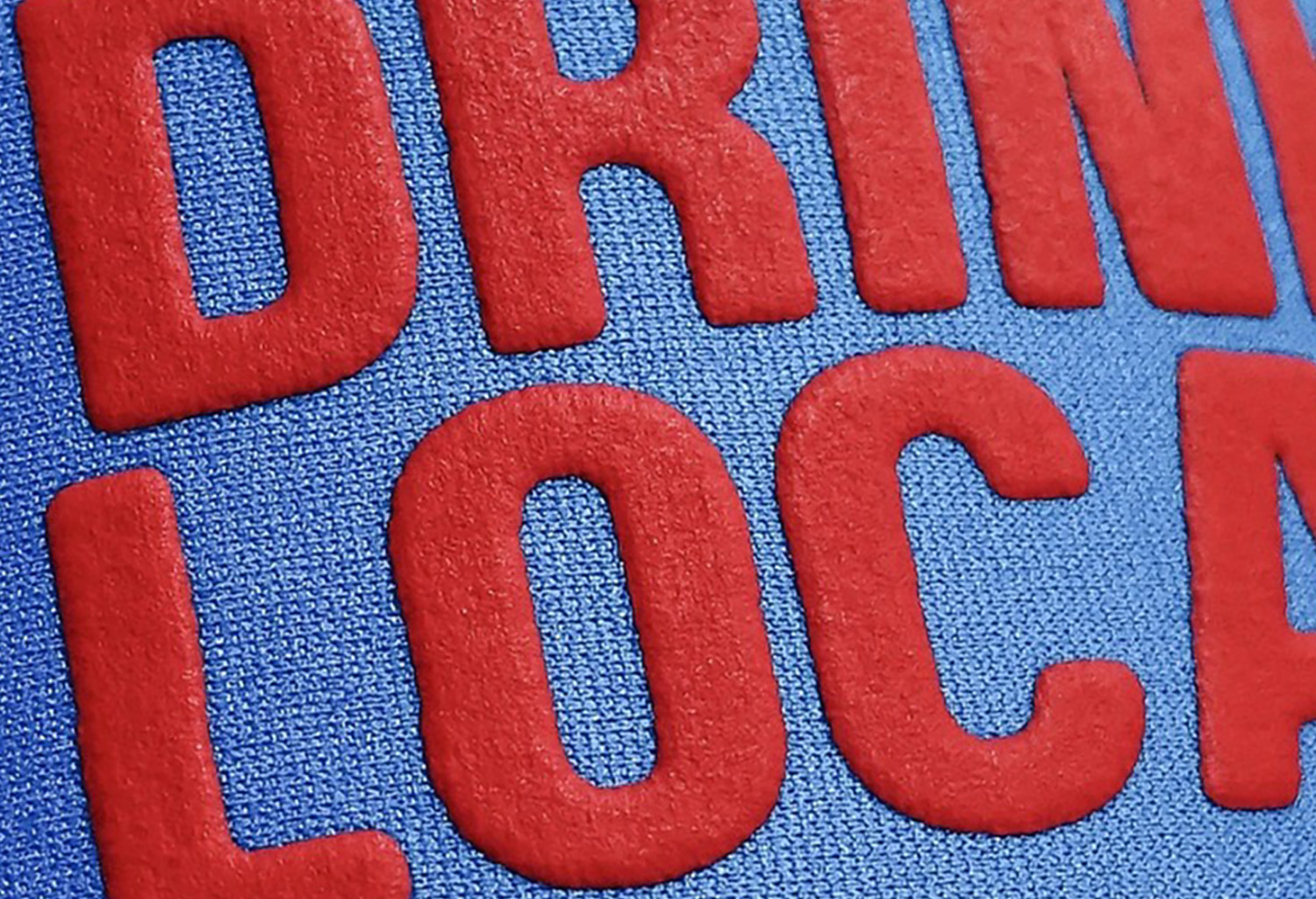 A close up image of a puff print on a foam trucker hat.