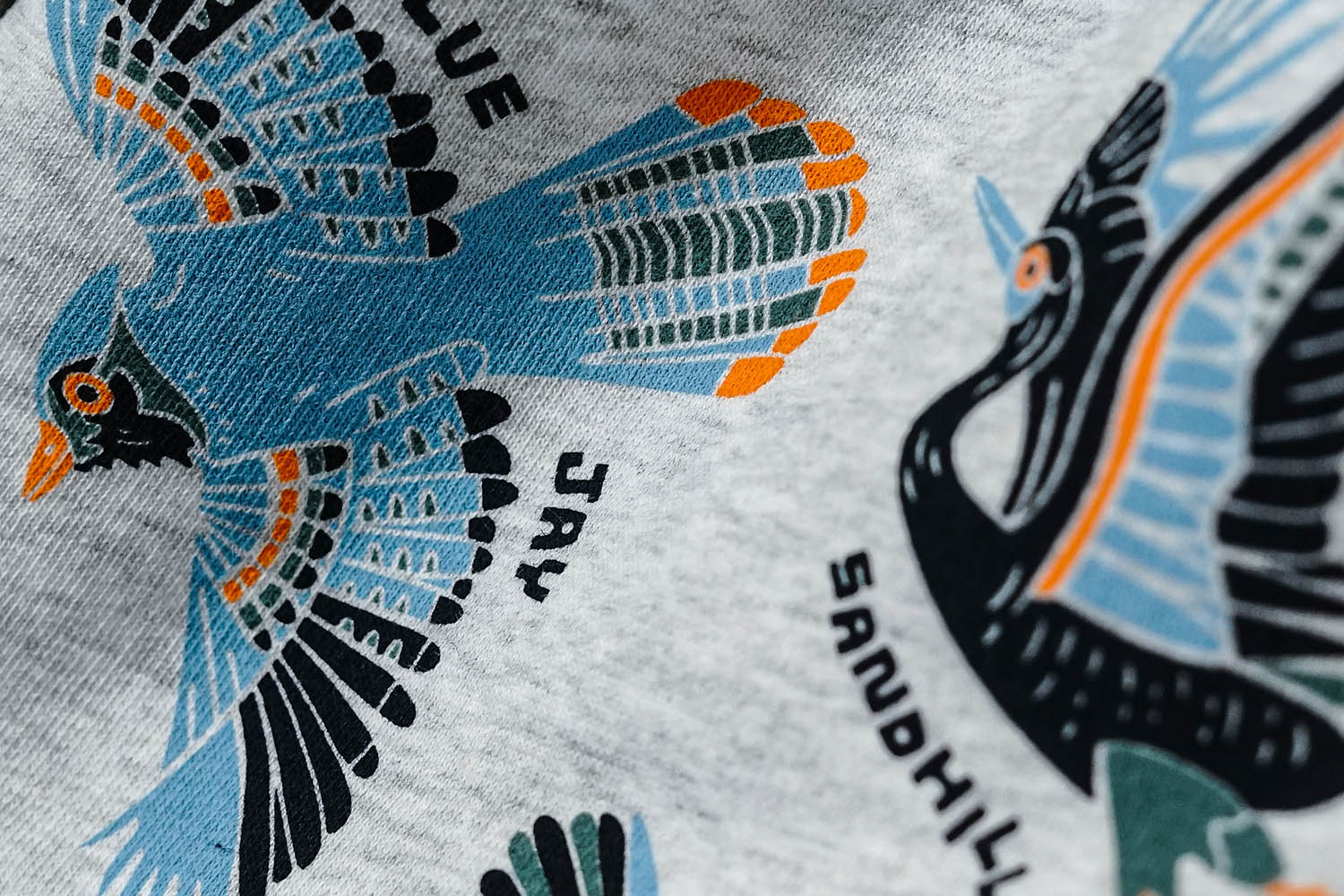 An image featuring water based ink and a wood cut printed design.