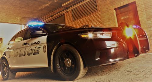 Alliance Police Cruiser in alleyway