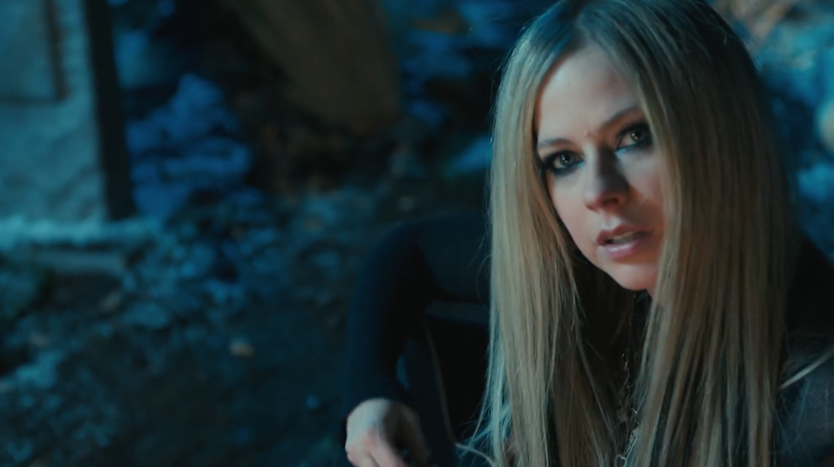 Avril Lavigne on music video set for FLAMES with guitar for Vitru productions 