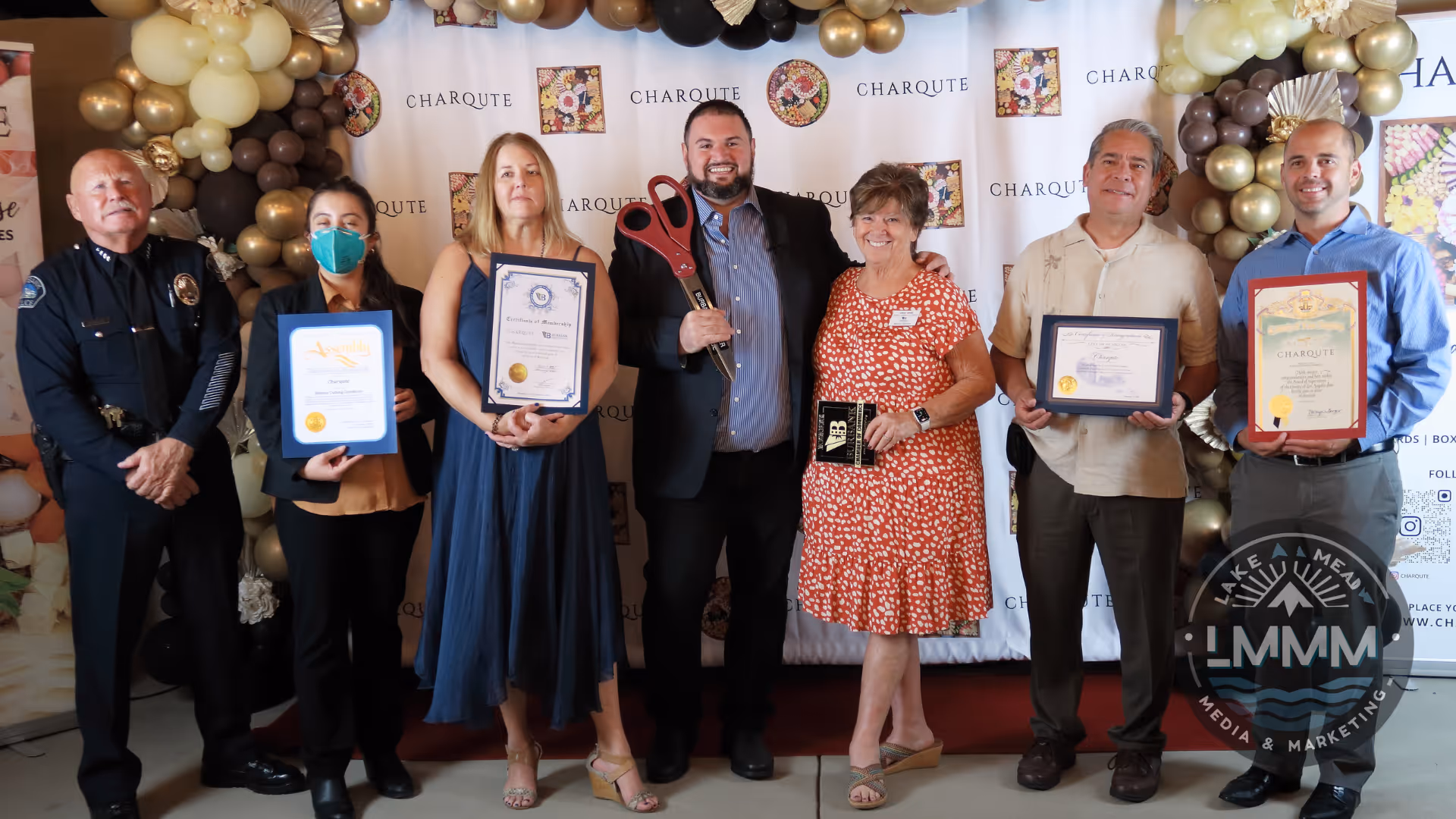 Chamber of commerce business opening photography Las Vegas - group photo with awards ceremony and balloon decorations by Lake Mead Media Marketing