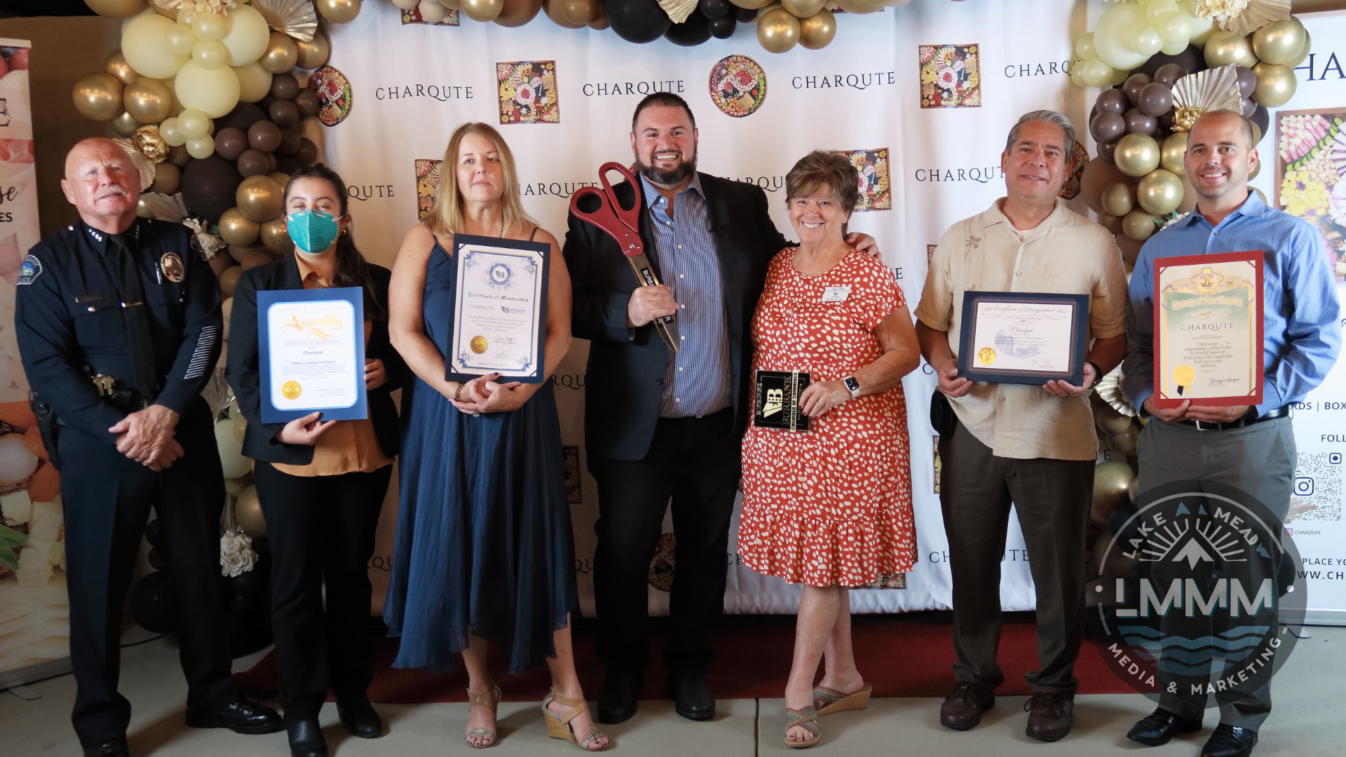 Chamber of commerce business opening photography Las Vegas - group photo with awards ceremony and balloon decorations by Lake Mead Media Marketing