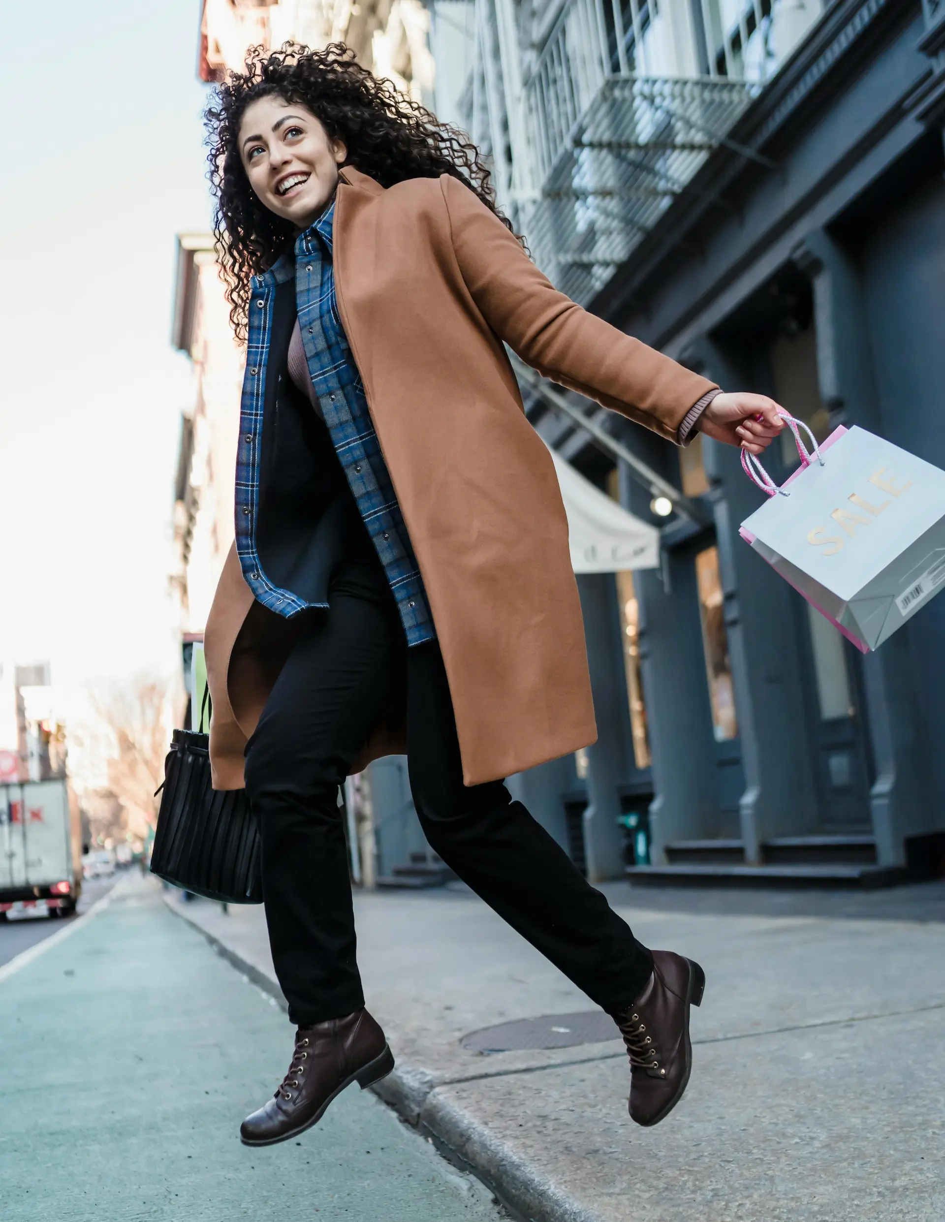 A happy customer jumping in air for joy