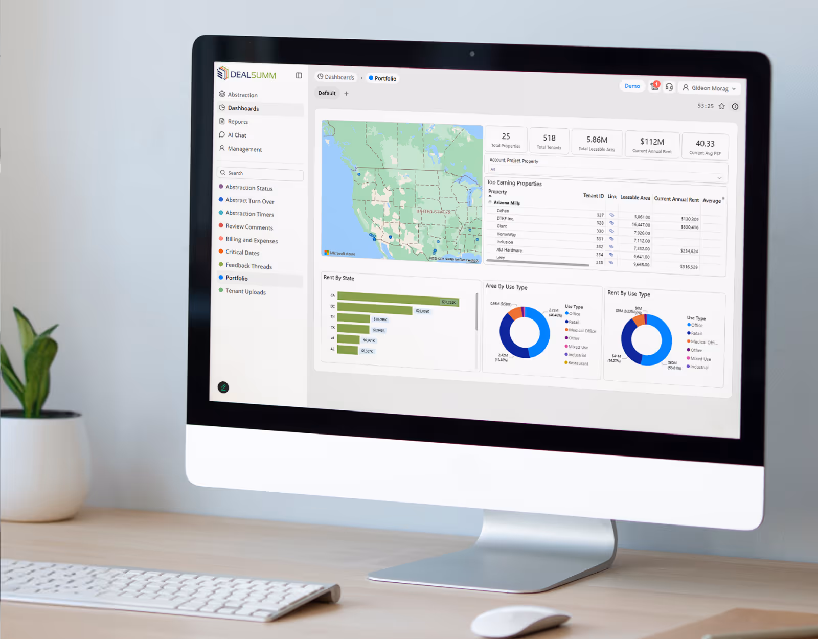 Computer screen displaying a real estate portfolio dashboard with maps, charts, and property financial data.