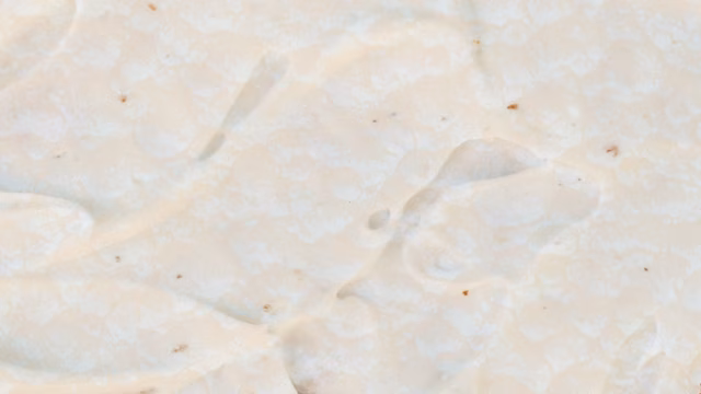 Clumpy, white cottage cheese-like texture similar to yeast infection discharge