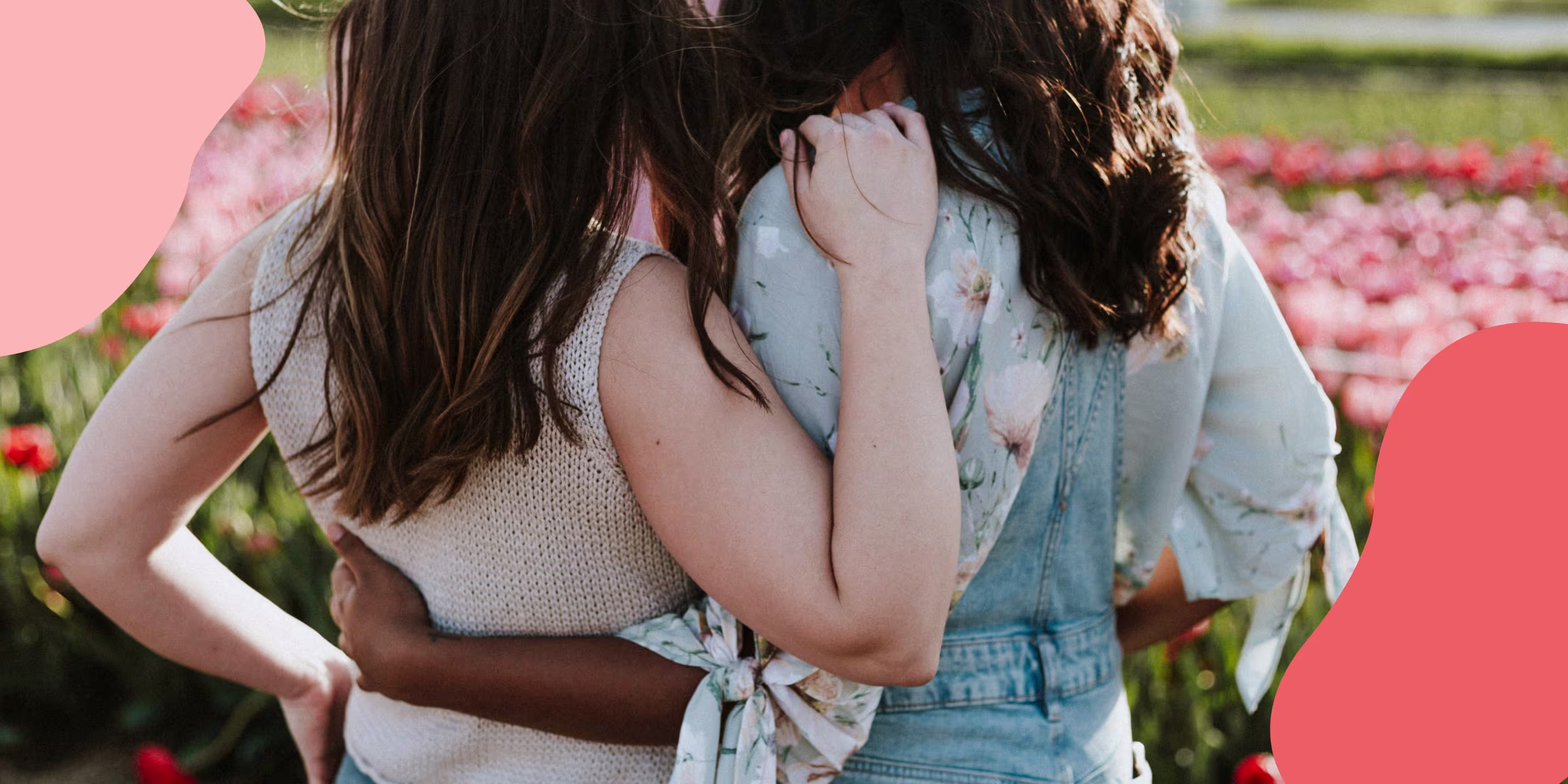 Image of two women side-hugging and facing away from the camera
