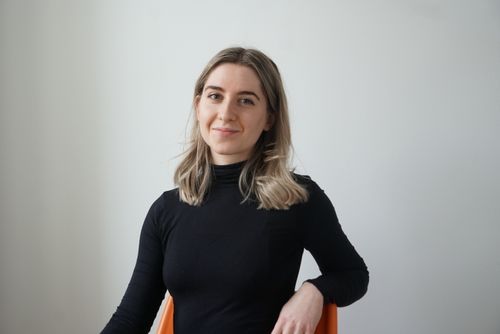 A picture of Kristina on a chair