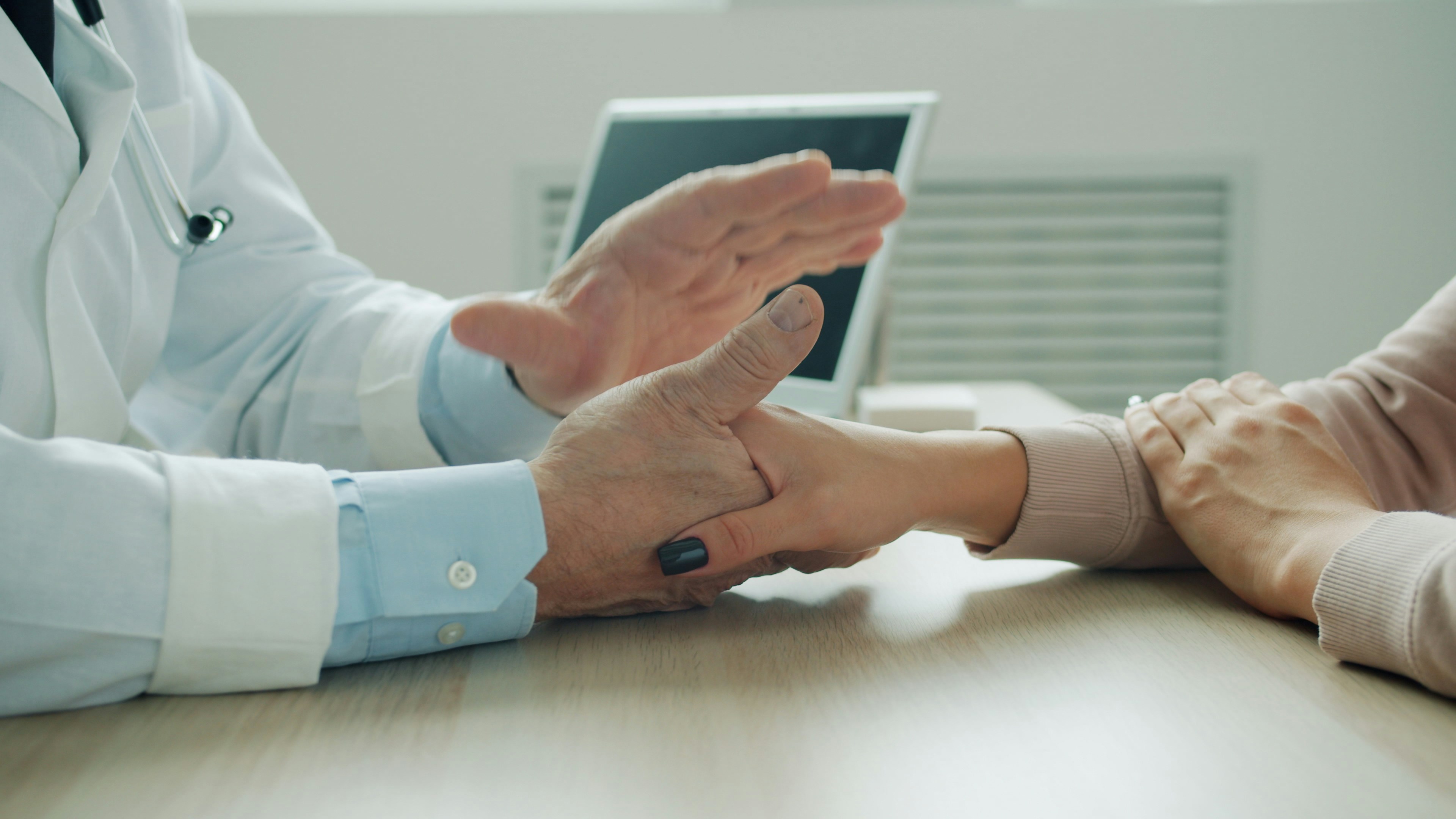 Doctor discussing treatment options with a patient during a consultation