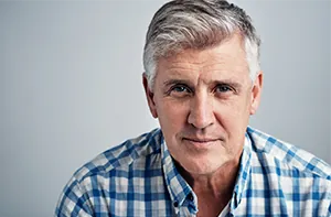 Older man considering same-day outpatient shoulder replacement surgery