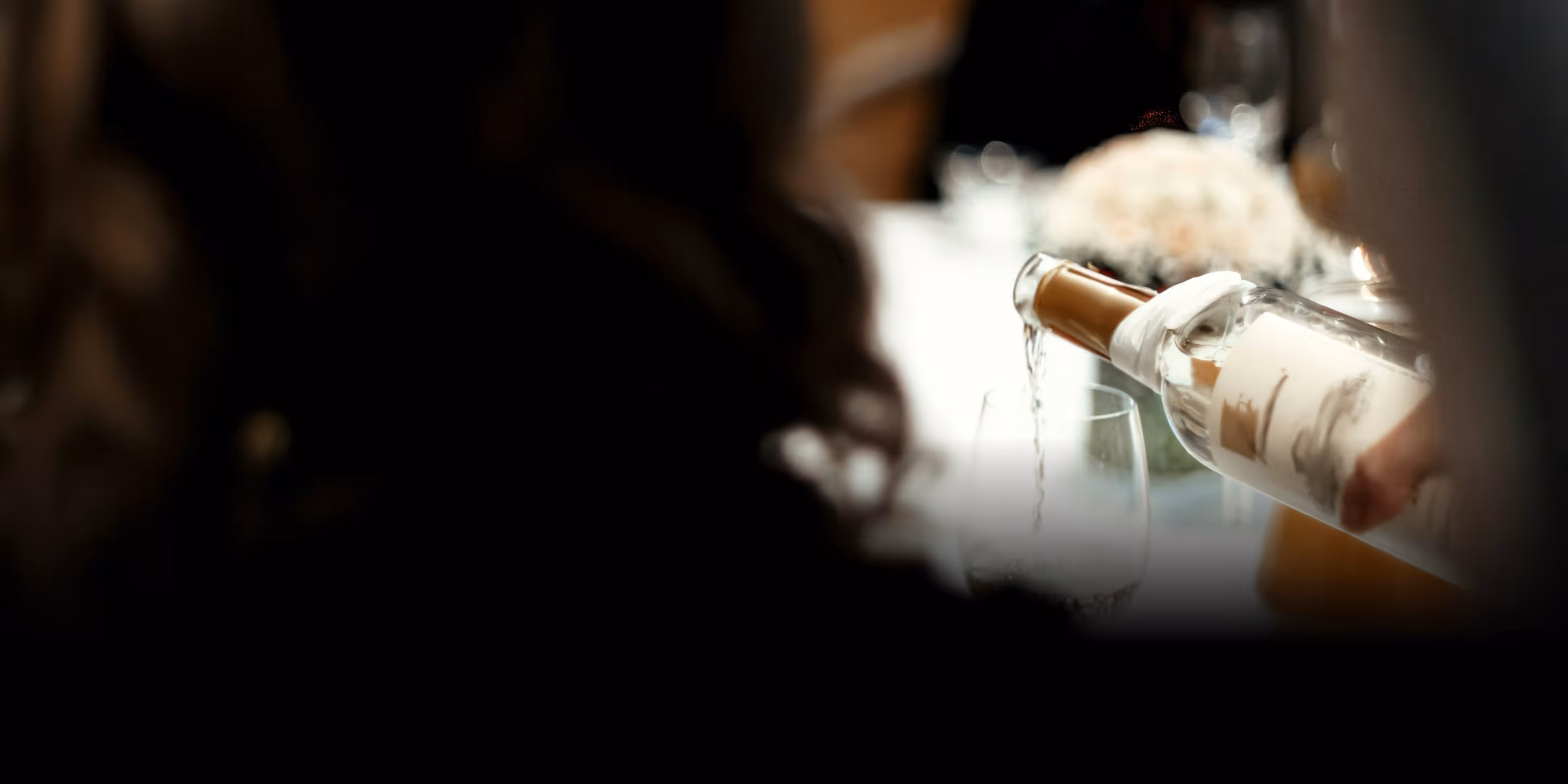 Wine being poured into a glass