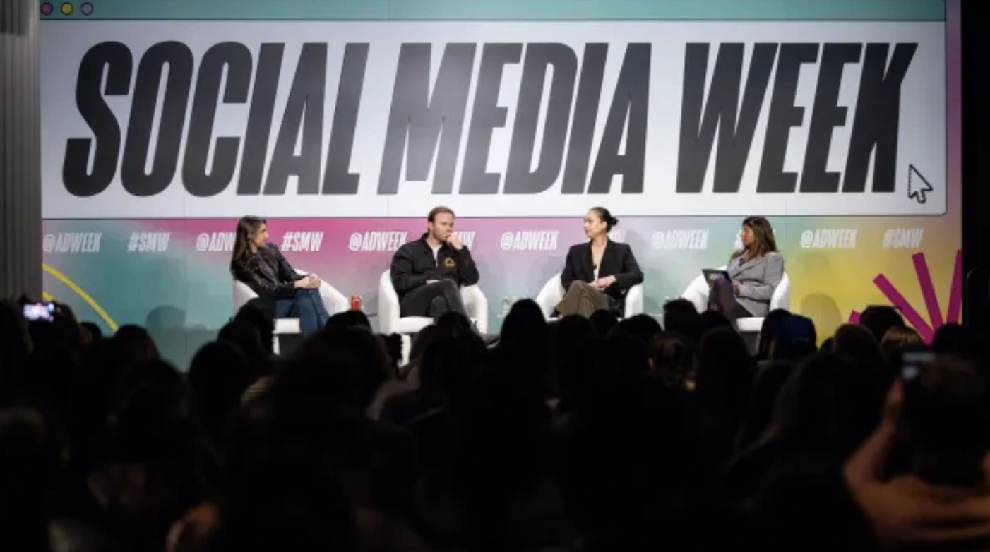 Social Media Week speakers presenting on stage