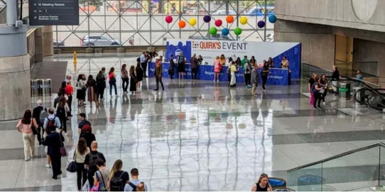 Conference registration desk at Quirk's Event