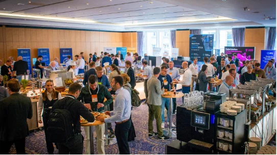 Attendees networking at Intra.NET Reloaded USA