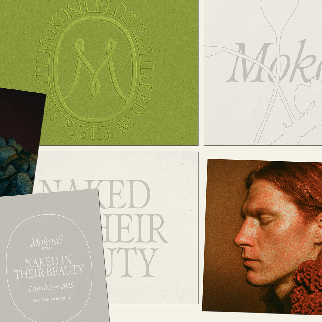 Large decorated Christmas tree with a star on top in front of the Spasskaya Tower of the Moscow Kremlin.