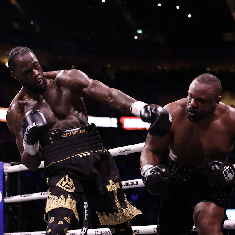 Deontay Wilder edged Derek Chisora in a messy but thrilling 12-round heavyweight fight featuring knockdowns, point deductions and late drama.