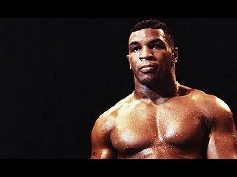 Young Mike Tyson pictured shirtless against a black background in a video thumbnail.