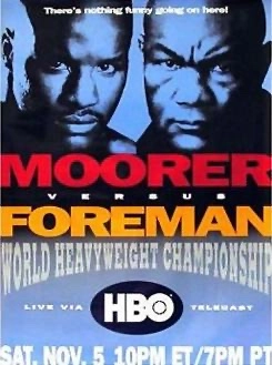 Michael Moorer versus George Foreman world heavyweight championship poster with November 5 lettering.