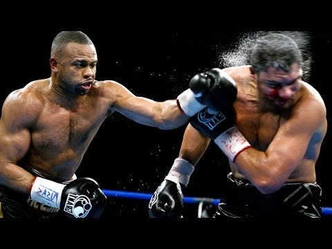 Roy Jones Jr. lands a left hand on John Ruiz during their heavyweight title fight.