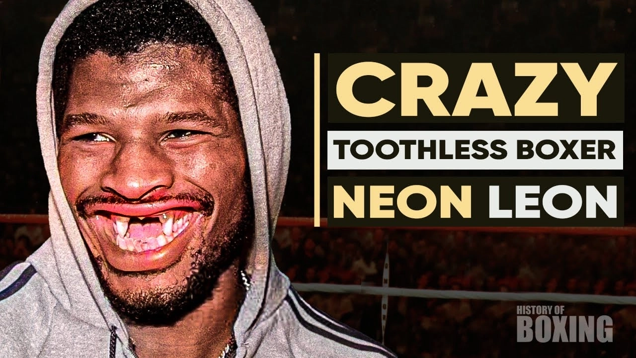 Video thumbnail featuring a smiling Leon Spinks wearing a grey hooded tracksuit.
