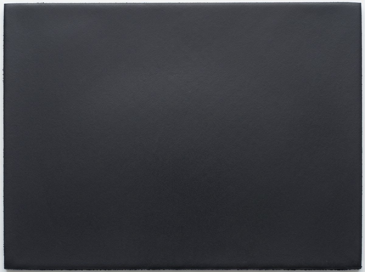 Smooth, dense virgin rubber flooring in deep charcoal