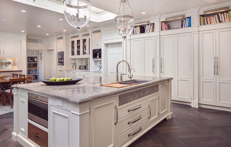 Clean kitchen with cream colored cabinets