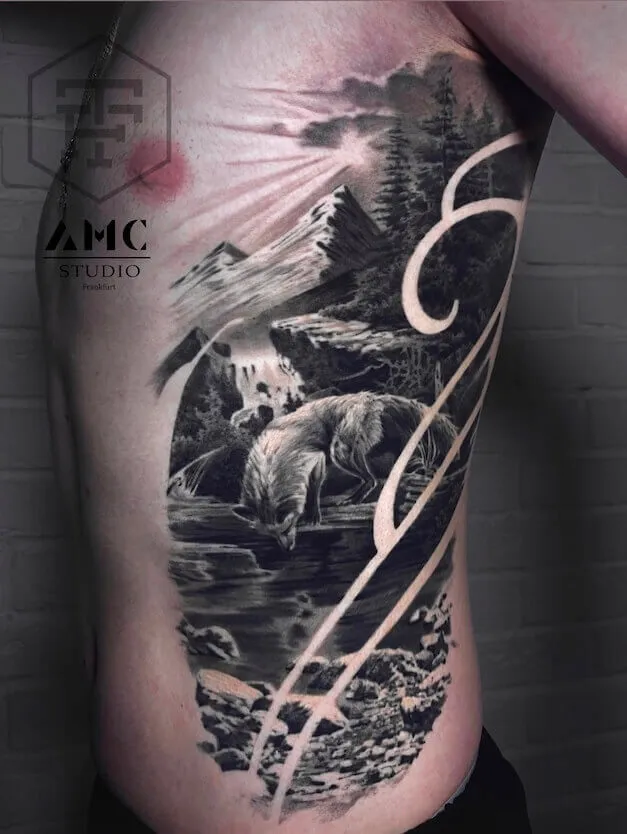 beautiful wild wolf tattoo on ribs