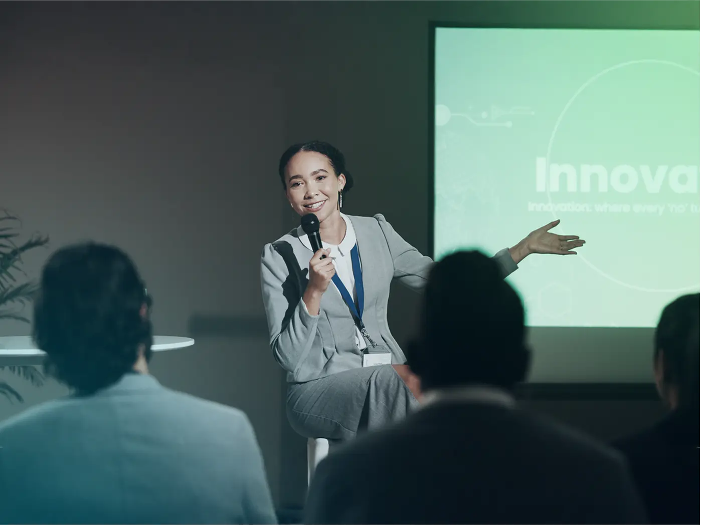 Woman leader giving a speech as a part of thought leadership programme 