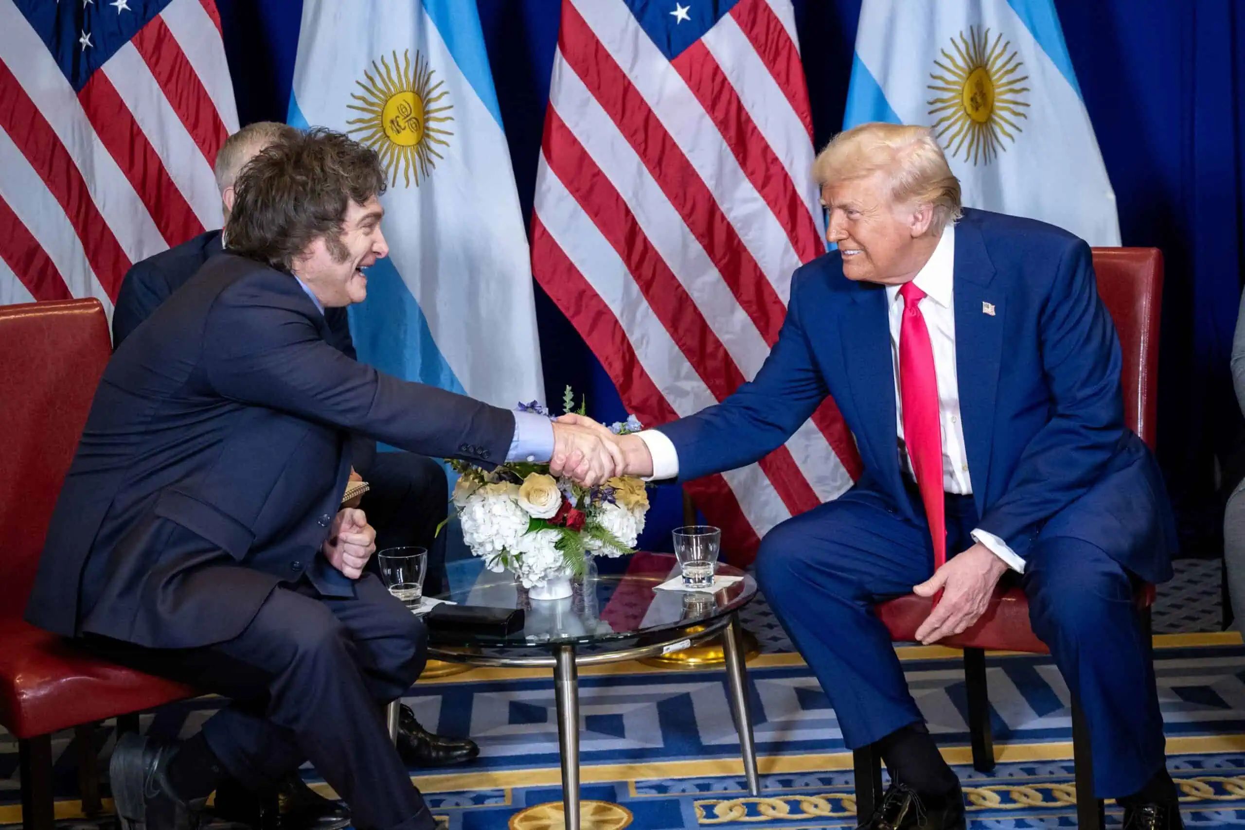 https://cdn.prod.website-files.com/6655a56fefa3320e504d78d2/6a7326954a903f2dc3af174d_Milei-Trump3-scaled.webp}