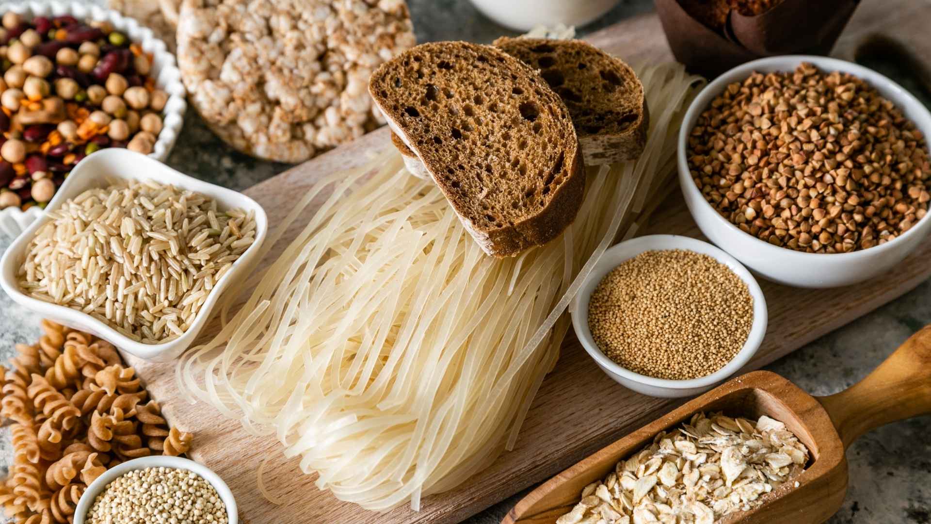 Various sources of carbohydrates, such as bread, grains, and pasta