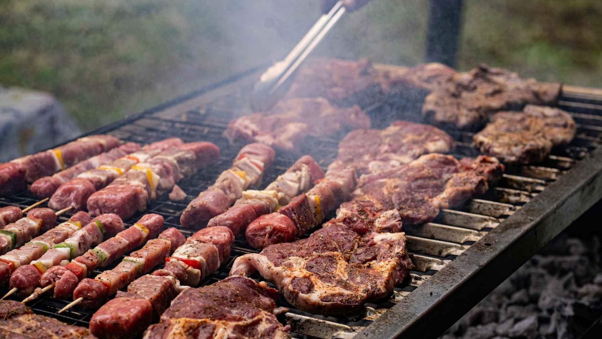 Meat cooking on a grill