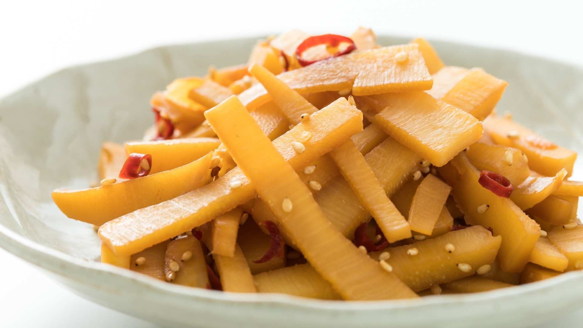 A bowl of cooked bamboo shoots with chilli
